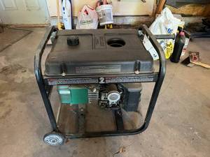 lot 82 image: Coleman Powermate 5000 Generator