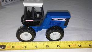lot 96 image: Ford 256 Versatile Tractor 1989 Dealers Meeting