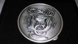 lot 185 image: John Deere Belt Buckle Trademark