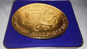 lot 310 image: John Deere Belt Buckle One Millionth Garden Tractor 6226000