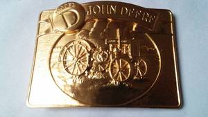lot 344 image: John Deere Belt Buckle Model D Tractor In Gift Box 32176000