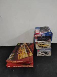 Three Model Cars With Two Painting Kits