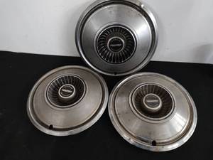 Three Dodge Hubcaps
