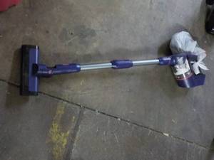 Stick Vacuum powers on and accesso...