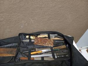 HUNTING BAG WITH KNIVES AND SLINGSHOT