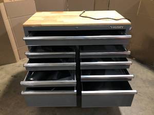 Husky 46 in. W x 24.5 in. D Standard Duty 9-Drawer Mobile Workbench Tool Chest with Solid Wood Top in Gloss Gray scratched on back see pictures  Customer Returns See Terms on Auction