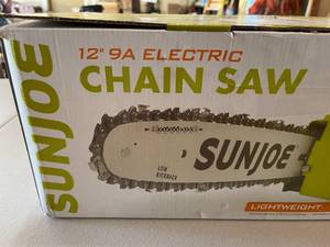 lot 85 image: SunJoe 12 Inch  Electric Chainsaw Model SWJ698E