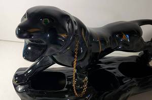 lot 6 image: Sleek Black Panther Planter