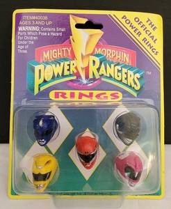 lot 31 image: Super Cool Set of Packaged Mighty Morphin Power Ranger Rings