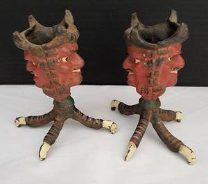 lot 45 image: Pair of Spooky Cast Iron Devil Head Candlestick Holders
