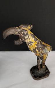 lot 168 image: Cast Iron Toucan Plus Red Wing Jug
