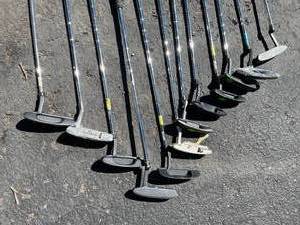 lot 139 image: 12 Golf Putters