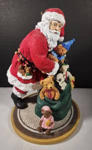 lot 178 image: Signed Holiday Pipka Santa Figure
