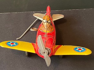 lot 128 image: 2 Vintage Metal Wind Up Planes