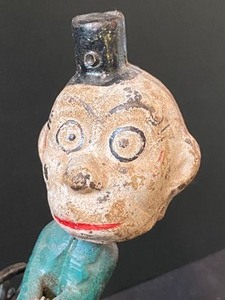 lot 210 image: Antique Cast Iron Nodder Figurine