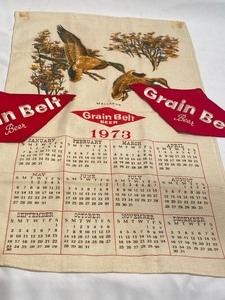 lot 422 image: 1973 Grain Belt Fabric Calendar with Two Patches