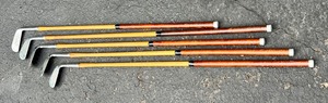 lot 556 image: Five Vintage Andy Robertson Golf Clubs