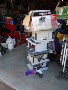 Qty of 4 Porter Cable 10 table saws. 1 powers up has cracked case. Others for parts or repair. With misc parts. As shown.