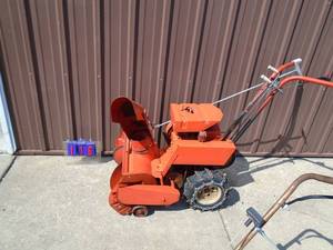 Gilson snow blower with chains. Tested & works. As shown.
