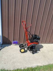 Earthquake front tine rototiller. Used condition. Tested & works. As shown.