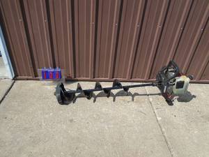 Strike Master 8 ice auger. Looks lightly used. Tested & works. As shown.