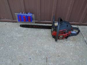 Poulan 16 chainsaw. Starts & runs. Seems to need a carb adjustment. As shown.
