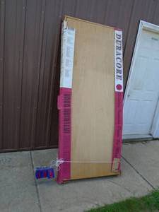 32 Wood interior door & frame. Never installed. As shown.