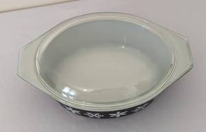 lot 24 image: Pyrex Black Snowflake Covered Casserole Dish