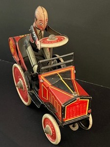 lot 8 image: Vintage Marx Wind Up Rocket Racer Tin Car
