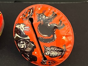 lot 29 image: Three Vintage Halloween Noise Makers