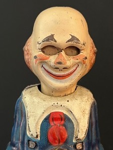 lot 31 image: Vintage 1950s U.S. Zone Germany Tin Toy Clown Stretches