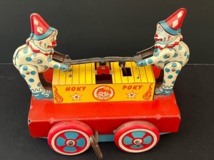 lot 40 image: Vintage Fun Wind-up Tin Hokey Pokey Clown Toy