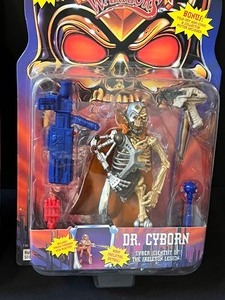 lot 56 image: Two Skeleton Warrior Action Figurines- Dagger and Dr. Cyborn - New in Package