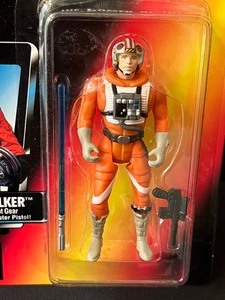 lot 79 image: NEW Star Wars The Power of the Force Luke Skywalker in X-Wing Fisher Pilot Gear Figurine