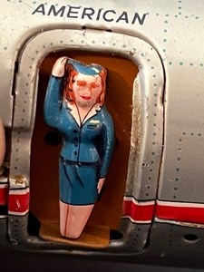 lot 97 image: Vintage Tin American Airlines Dc-7c Toy Plane