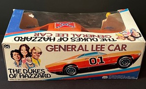 lot 103 image: Vintage Dukes of Hazzard General Lee Car with Luke and Bo Action Figures