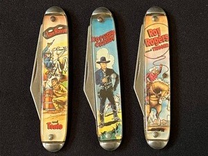 lot 134B image: Three Collectible Buck Knives Roy Rogers Collectible Buck Knife, Lone Ranger Buck Knife and Hopalong Cassidy Buck Knife