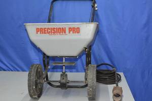 Flame thrower weed killer and fertilizer