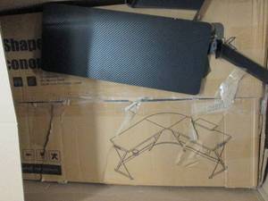 L shaped gaming desk with carbon fi...