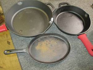 3 cast iron pans ...