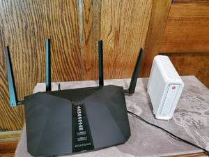 lot 264 image: NightHawk Router and SURFboard Modem