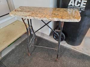 lot 151 image: Stone-Top Table Made From Sewing Cabinet Legs