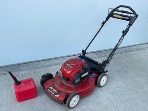 Toro Self Propelled Lawn Mower and Gas Can