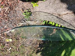 lot 105 image: Round Glass Pane