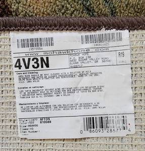 lot 52 image: Contemporary Mohawk Blue and Mocha Area Rug  9 x 6