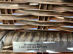 lot 98 image: Hampton Bay Cambridge Brown Wicker Outdoor Patio Lounge Chair with CushionGuard Midnight Navy Blue Cushions and Ottoman
