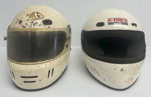 Two Well Used Racing Helmets Bell And G-Force