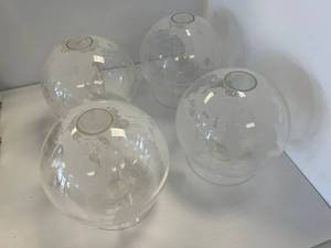 Group Of Four Acrylic Globes On Spinner Base