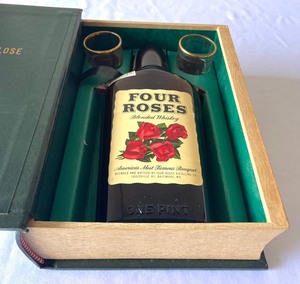 lot 92 image: Vintage Old Bankers Never Die Faux Book Set