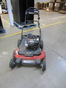 lot 493 image: TORO 21199 TimeMaster 30 in. Briggs & Stratton Personal Pace Self-Propelled Walk-Behind Gas Lawn Mower with Spin-Stop (USED, MISSING BAGGER, FRONT WHEEL A LITTLE BENT, SEE PHOTOS)